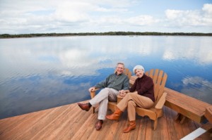 Couple sitting by water