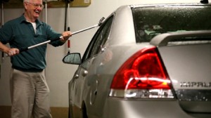 Man enjoying washing car