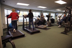 People working out in co-op fitness center