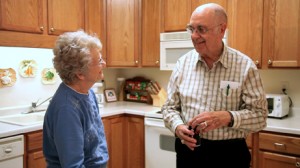 Couple in their kitchen