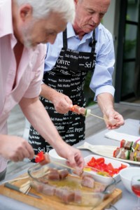 Men preparing kebabs